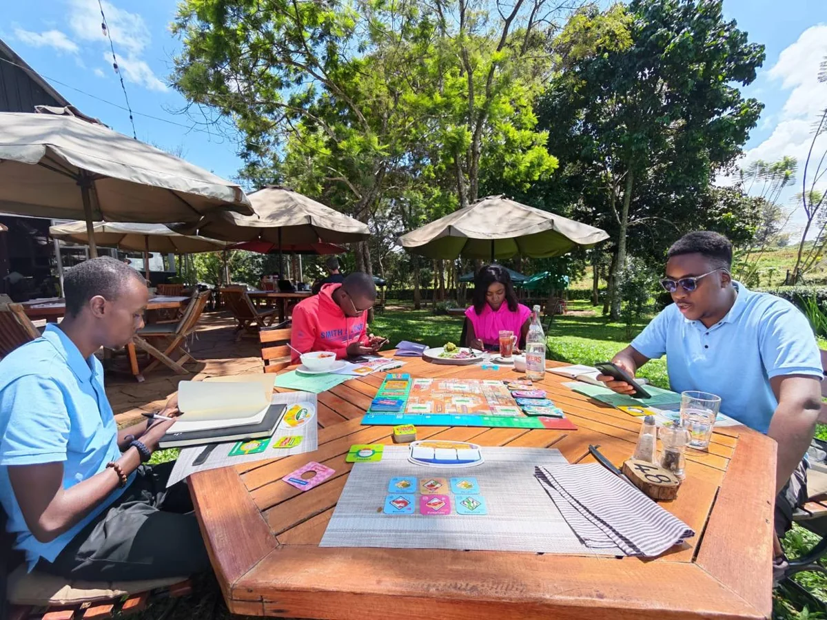 Group planning together around an outdoor table