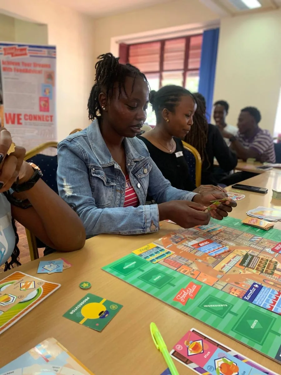 Participants learning with a board game